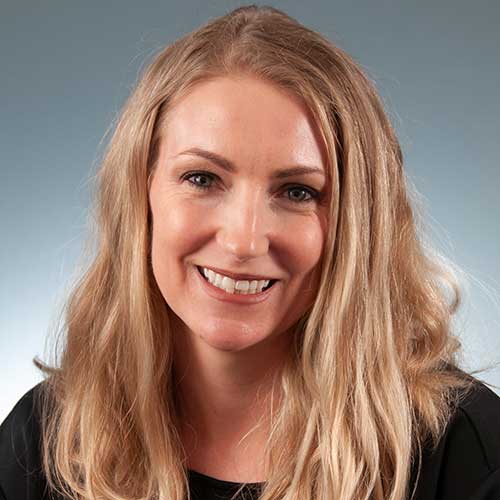a woman smiling for the camera