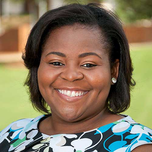 a woman smiling for the camera