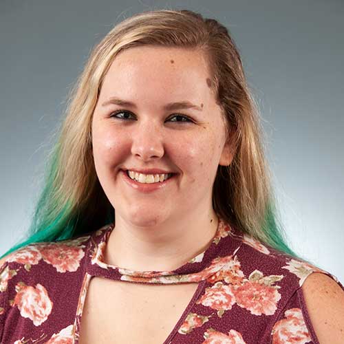 a woman smiling for the camera