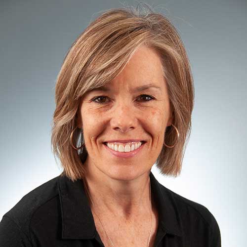 a woman smiling for the camera