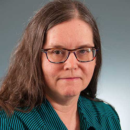 a close up of a person wearing glasses