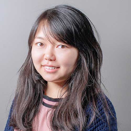 a person smiling for the camera