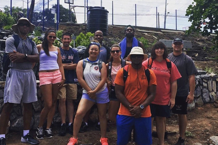 a group of people posing for the camera