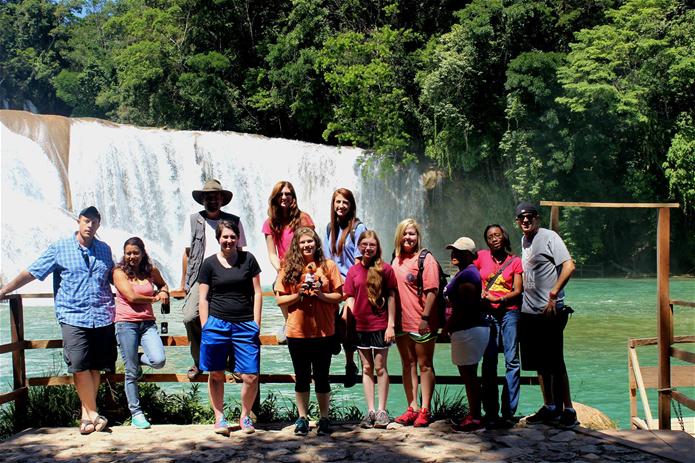 a group of people posing for a picture