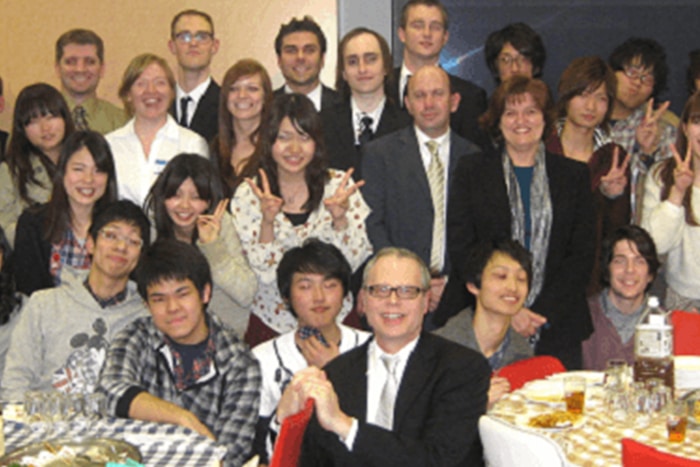 a group of people posing for a photo