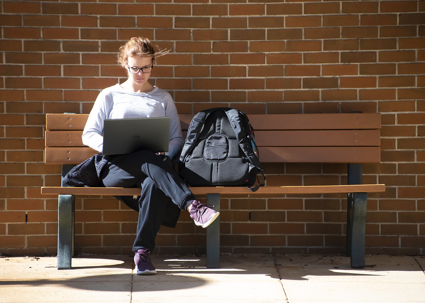 a person sitting on a bench