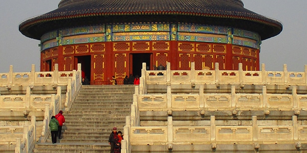 a group of people in front of a building