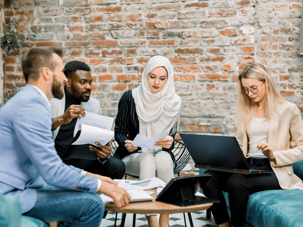 a group of people sitting at a table