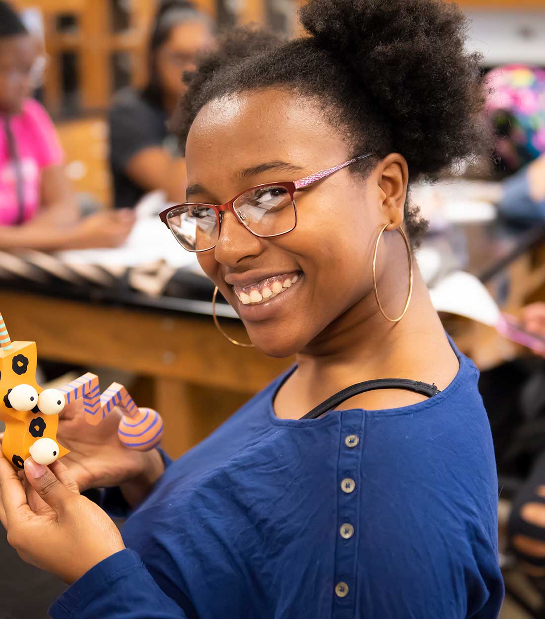 Girl smiling in biology class