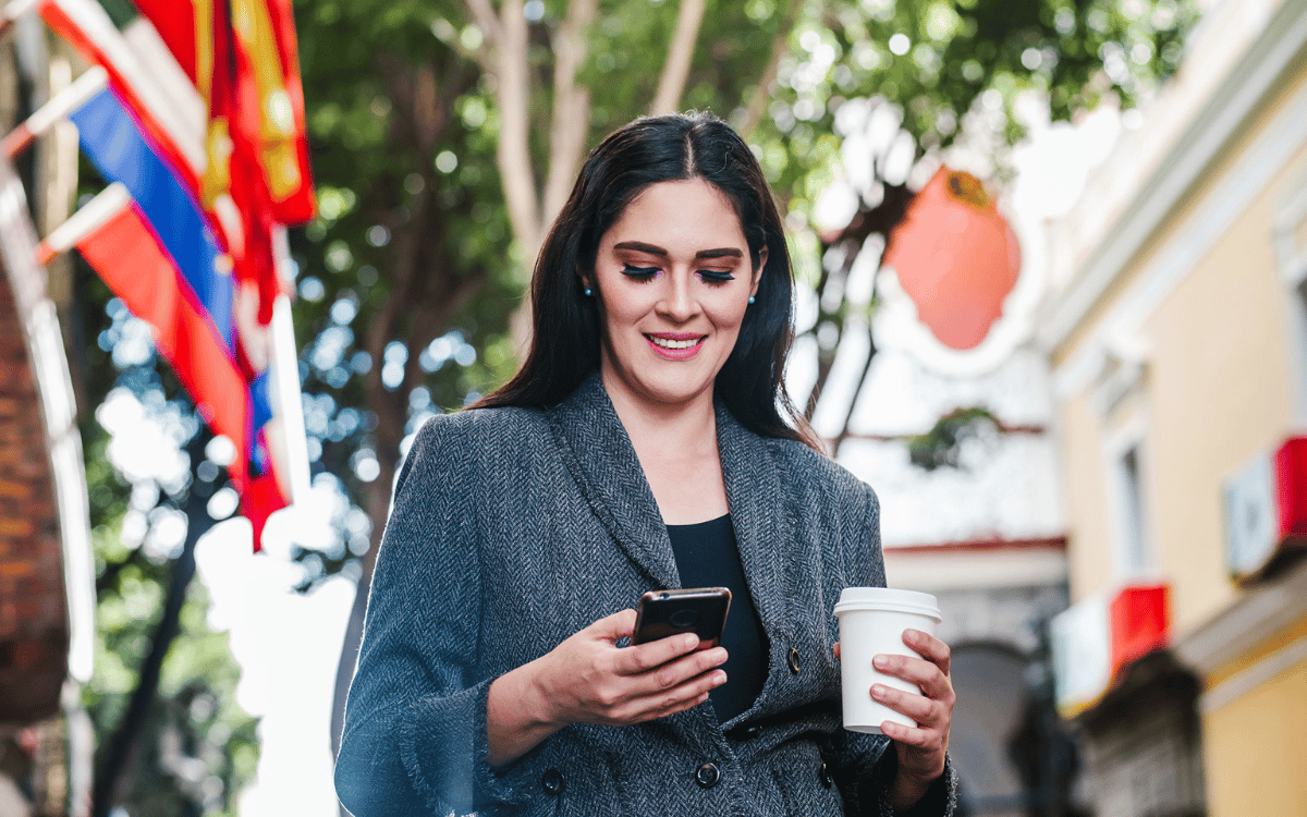 a woman holding a cell phone