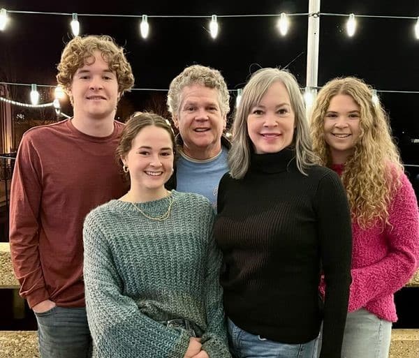 a group of people posing for a photo