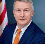 a man wearing a suit and tie