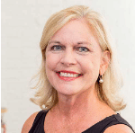 a woman smiling for the camera