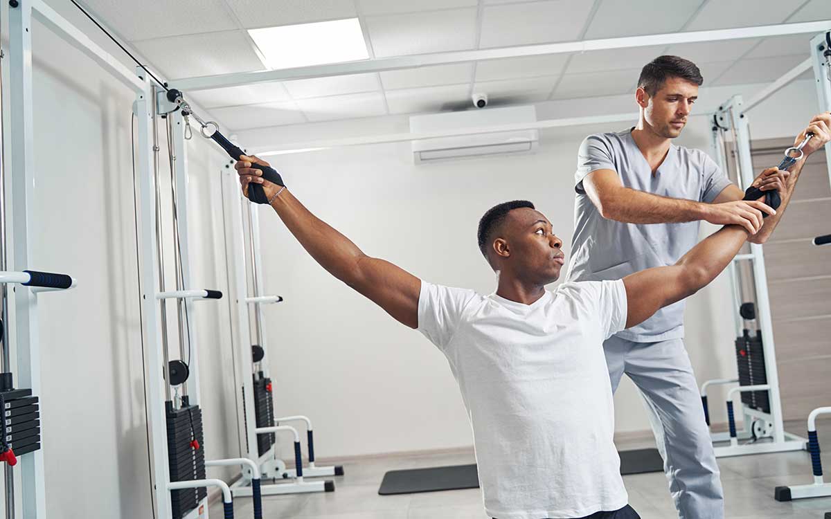 Exercise Science student working with a patient