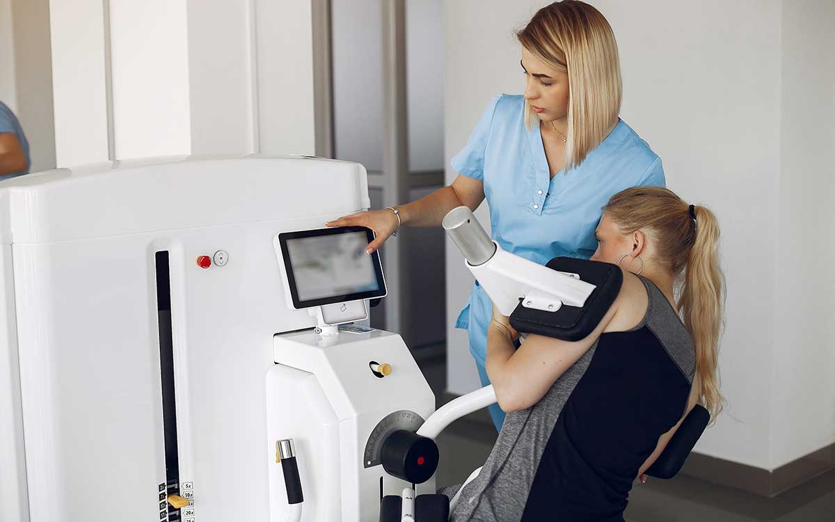 Exercise Science student working with a patient