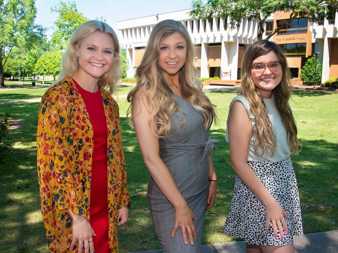 a group of people posing for the camera