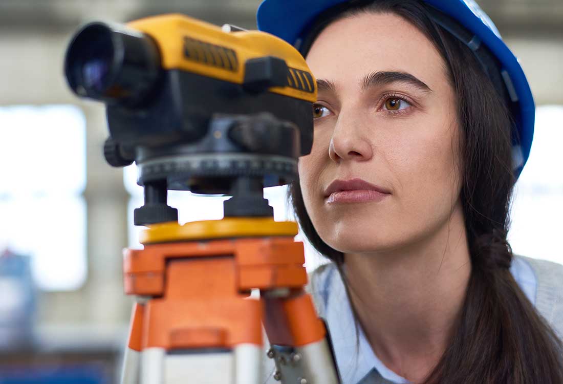 a young GIS female student using GIS equipment