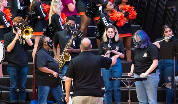 a group of people standing on a stage