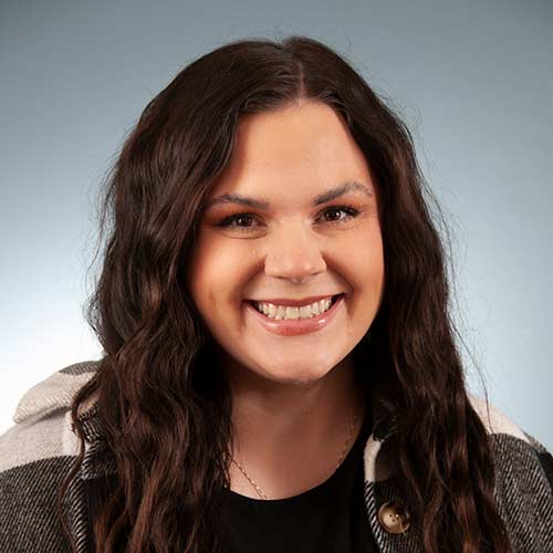 a woman smiling for the camera