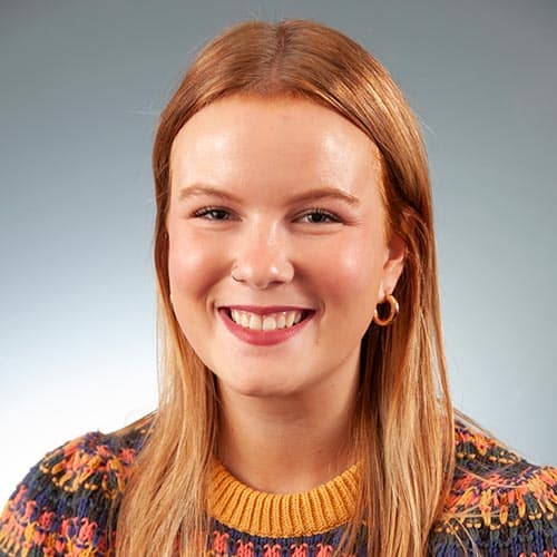 a woman smiling for the camera