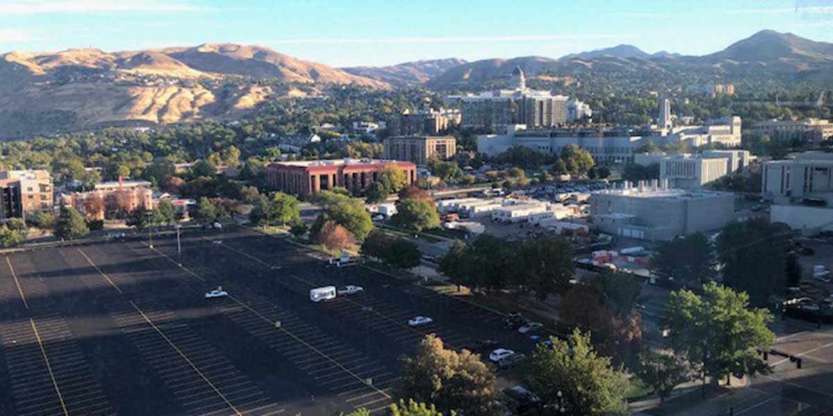 a view of a city with a mountain in the background