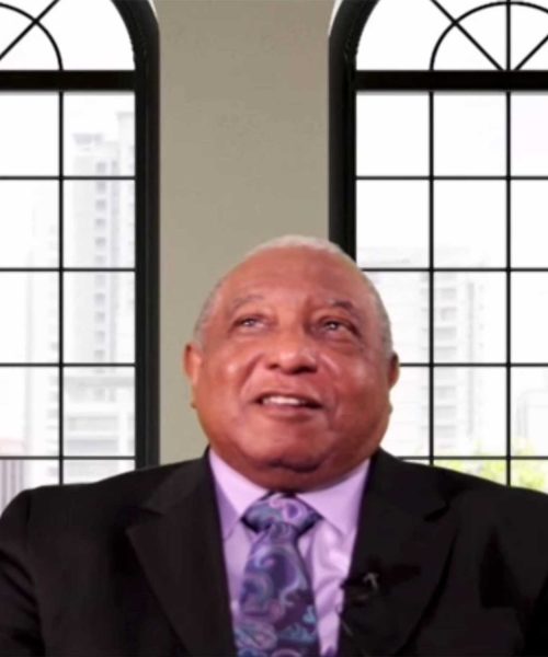 A Screen Shot Of A Man In A Suit And Tie