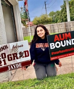 a person holding a sign