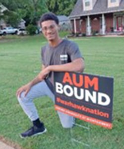 a man holding a sign