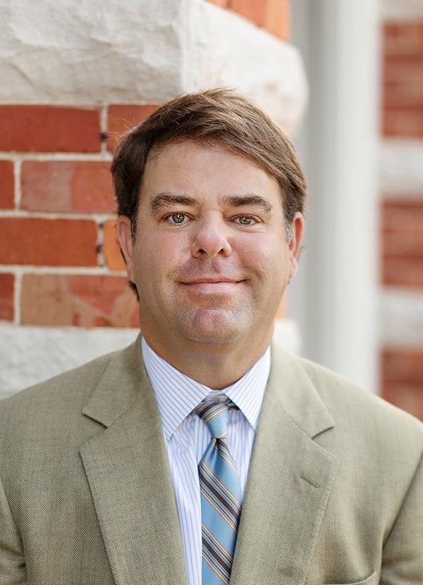 a man wearing a suit and tie