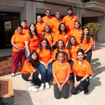 A Group Of People Posing For A Photo