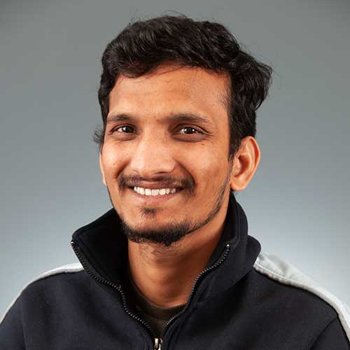a man smiling for the camera