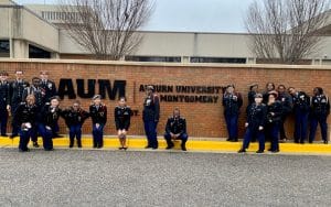 a group of people standing in front of a building