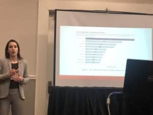 Julia Simoes presenting at 2023 SOBIE conference