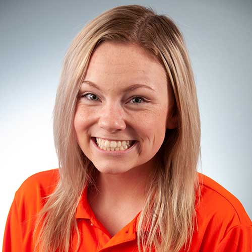 a woman smiling for the camera