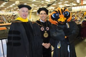 Commencement speaker Dr. Rick Bright with AUM Chancellor Carl A. Stockton and mascot Curtiss The Warhawk.