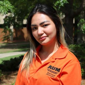 A Woman Wearing An Orange Shirt