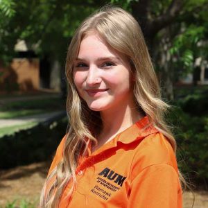 A Woman Wearing An Orange Shirt