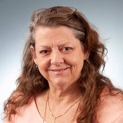 a woman smiling for the camera