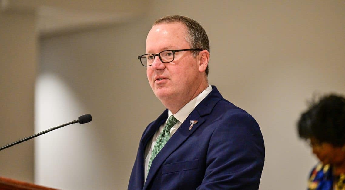 a man wearing a suit and tie