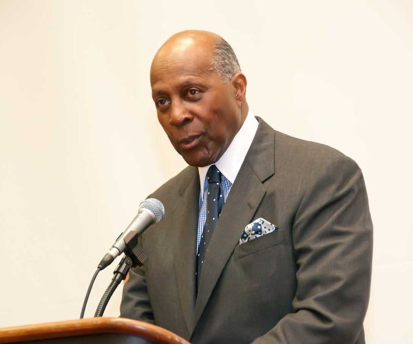 Vernon Jordan Wearing A Suit And Tie