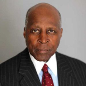 Vernon Jordan Wearing A Suit And Tie