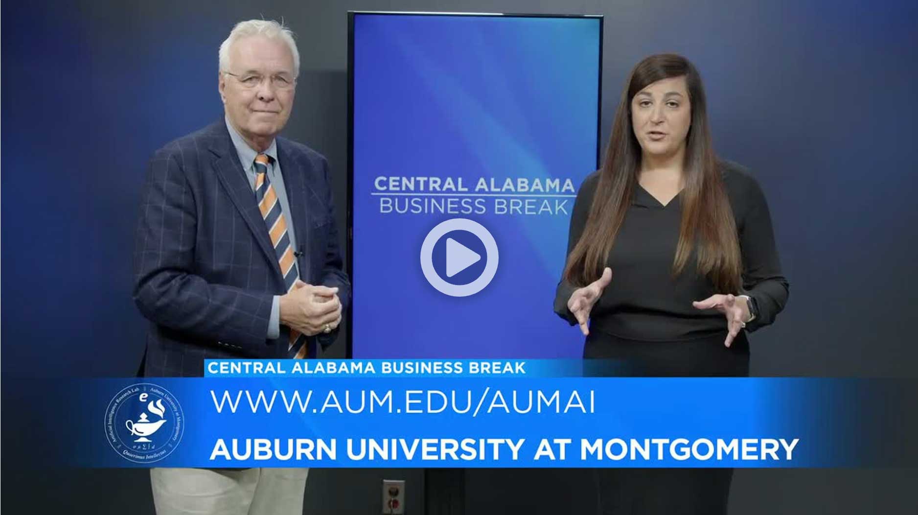 a screen shot of Mike Price in a suit and tie