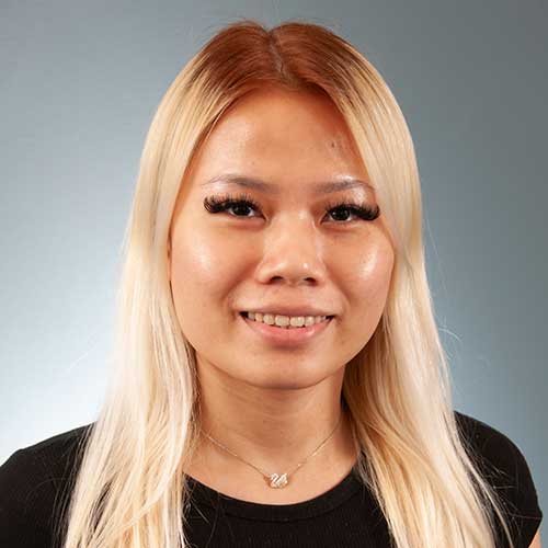 a person smiling for the camera