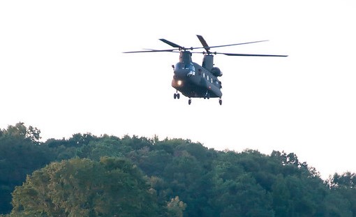 A helicopter flying in the sky for AUM Army ROTC 