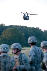 AUM Army ROTC riding on a helicopter