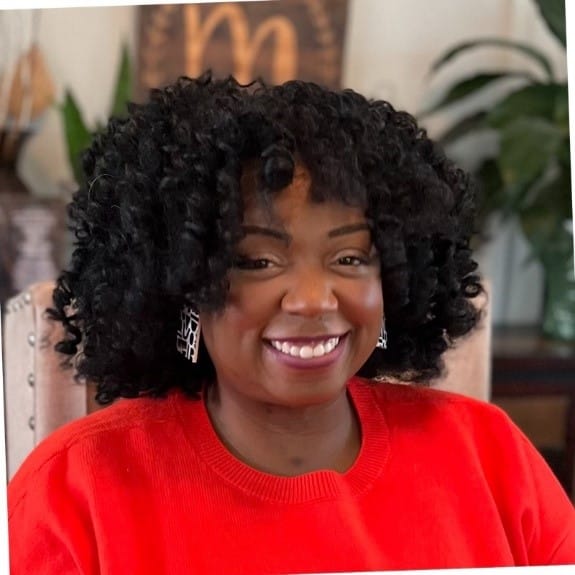 a person smiling for the camera