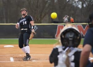 a group of baseball players playing a football game