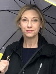 a woman holding an umbrella