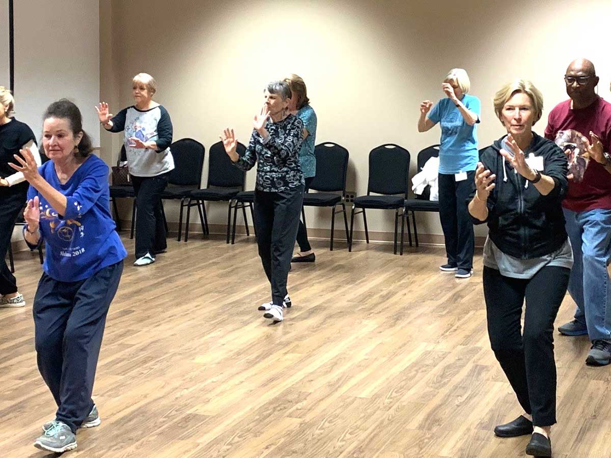 a group of people standing in a room