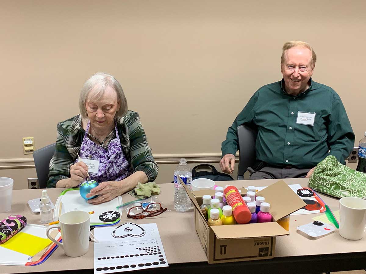 a group of people sitting at a table